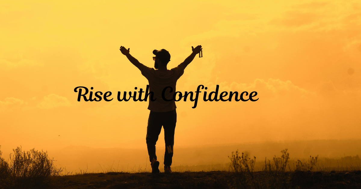 Man standing with raised hands towards sunrise, symbolizing self-confidence, empowerment, and new beginnings.